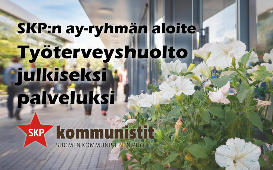 Kuvituskuvassa kukkia terveysaseman sisäänkäynnin edessä