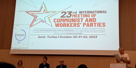 Maailman kommunististen ja työväenpuolueiden kokouksen logo.